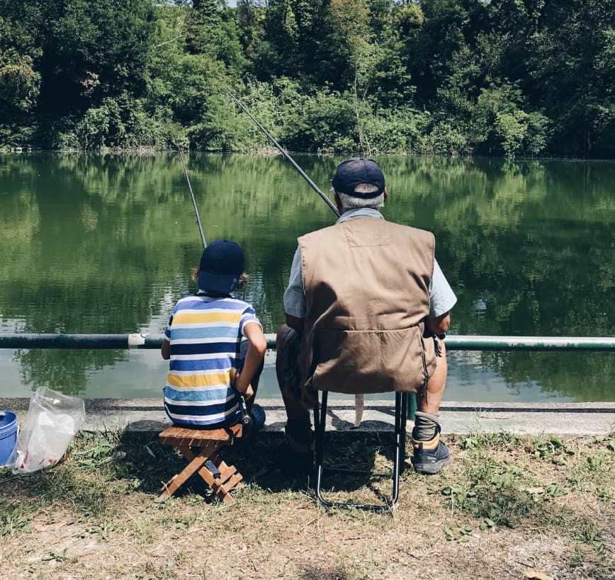 Navigate_Wellness-Grandpa-and-grandson-fishing
