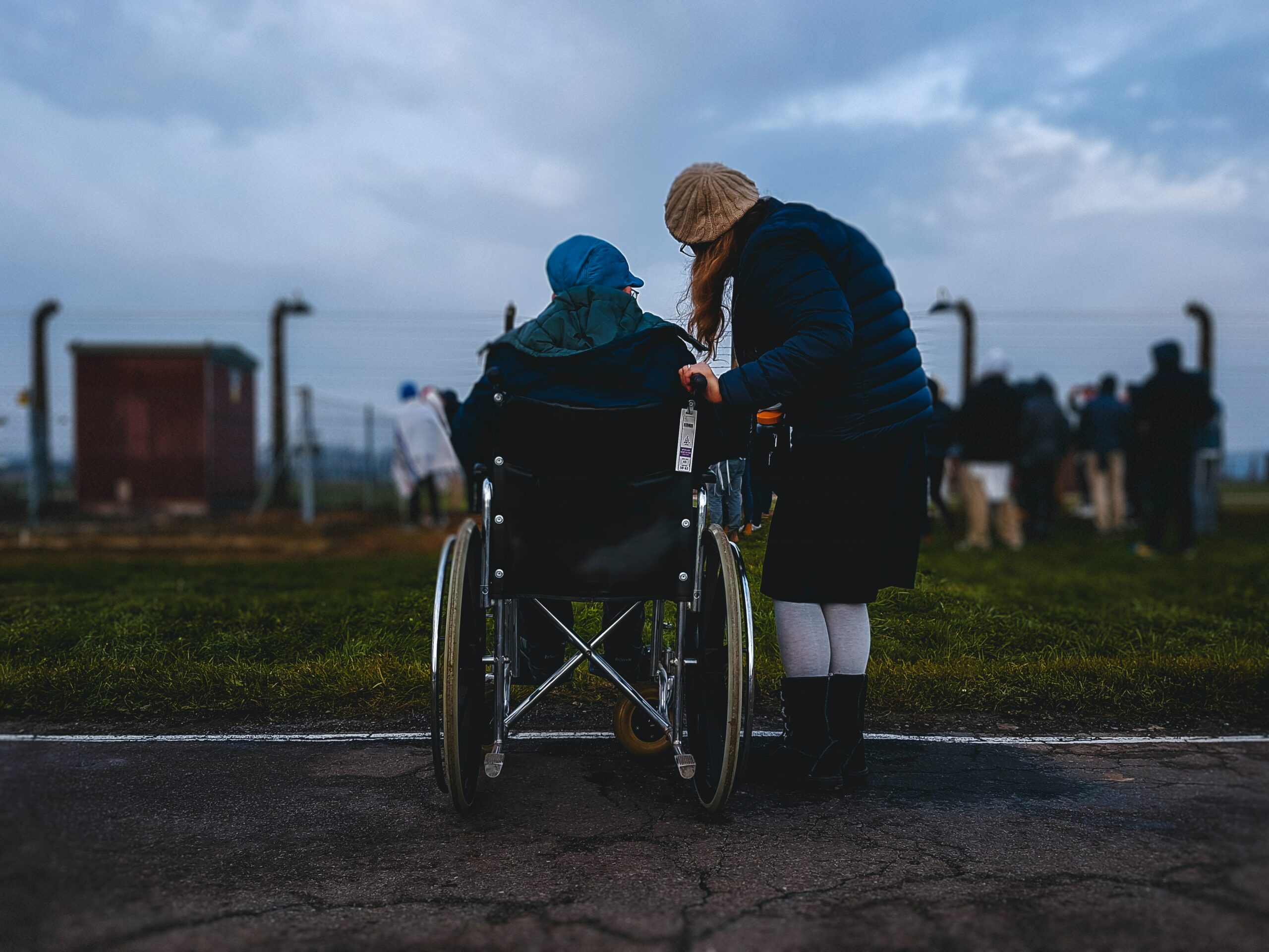 Caretaker-helping-woman