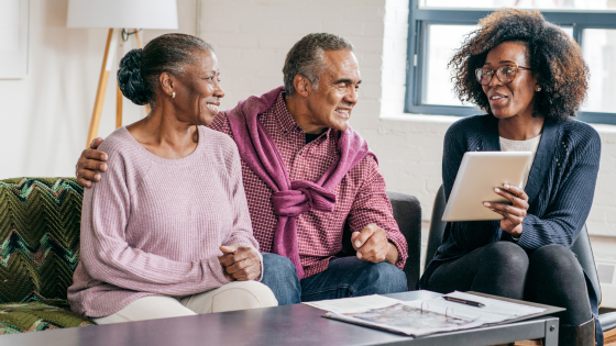 An elderly couple discussing their options for health insurance for senior care