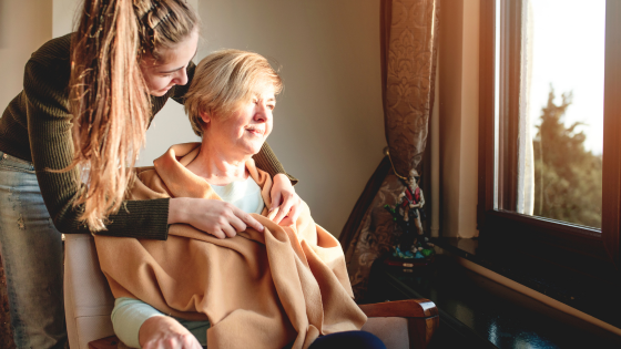 a woman gets hospice care at home